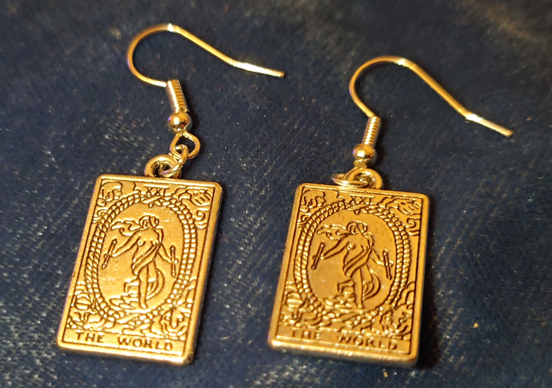 Tarot earrings - The Moon - gold metal · Tarot earrings - The World - silver metal